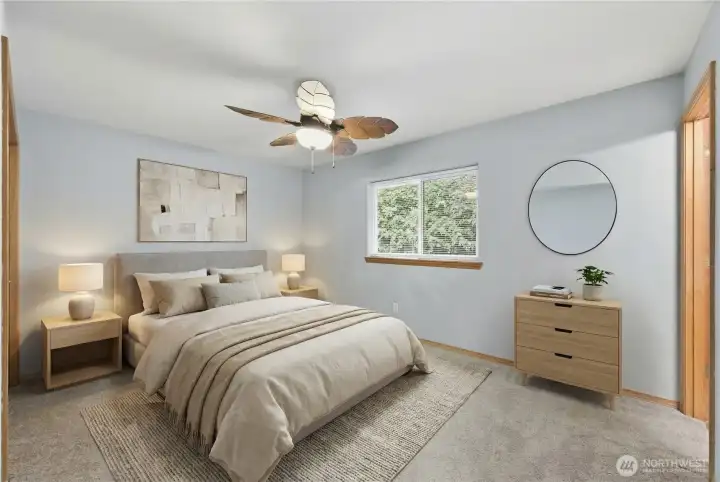 Virtually staged. Spacious primary suite with its own full bath.