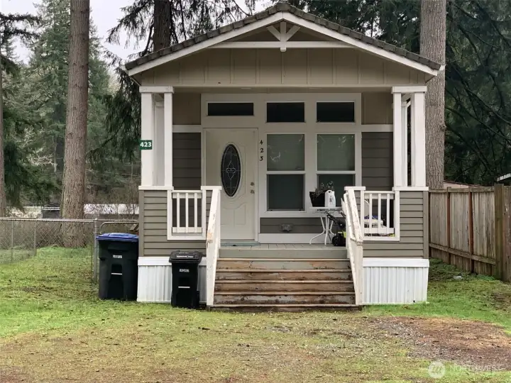 Beautiful 1 bedroom, 1 bath home with covered front porch, plenty of parking space and fenced side yard.  Located in Melody Pines - all ages, community park, RV parking and more!
