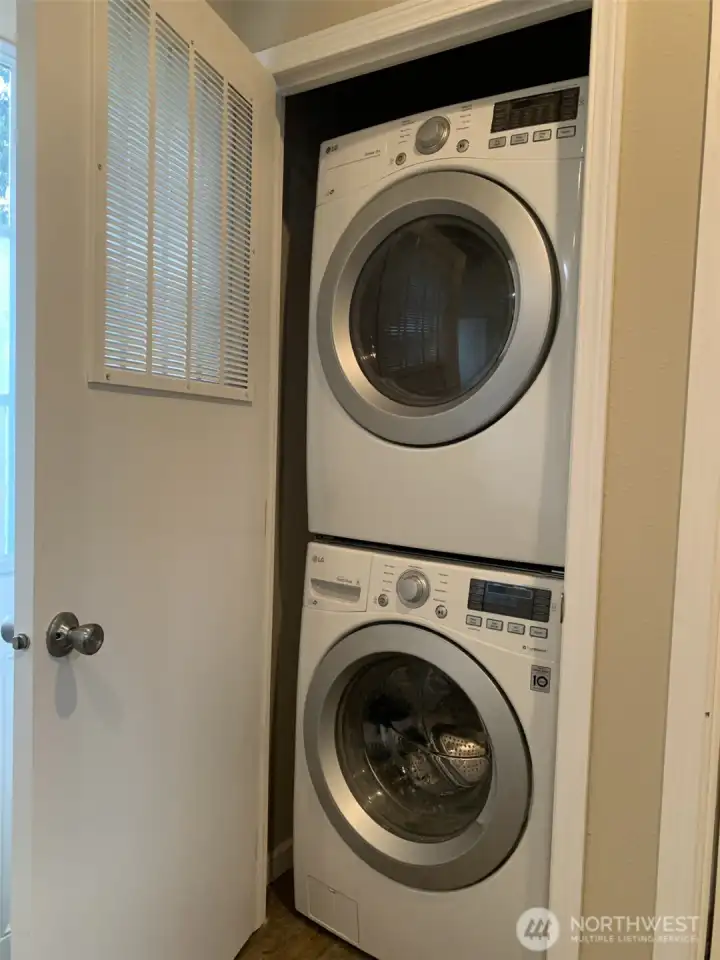 Utility closet is located off the kitchen.