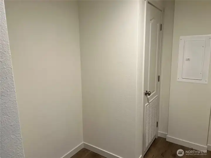 Utility room with space for extra storage.