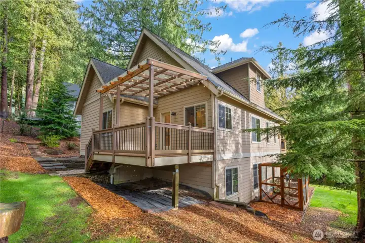 Covered deck for for year-around outdoor living.