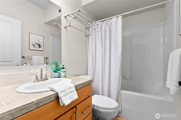 Full bathroom in the bonus room with vanity, tub/shower combo, and functional layout