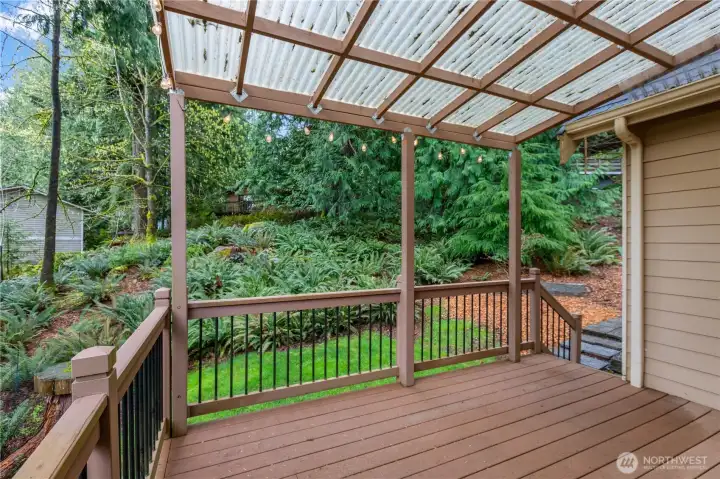 The covered deck extends usable outdoor living space.