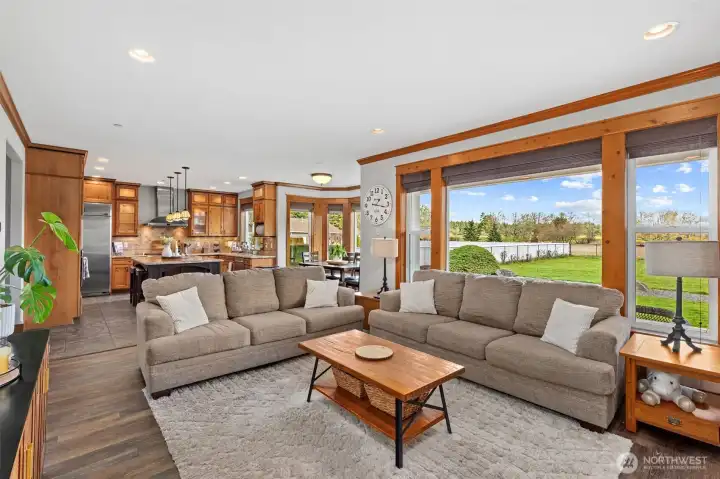 Family Room, with view into kitchen, casual dining area, and back yard