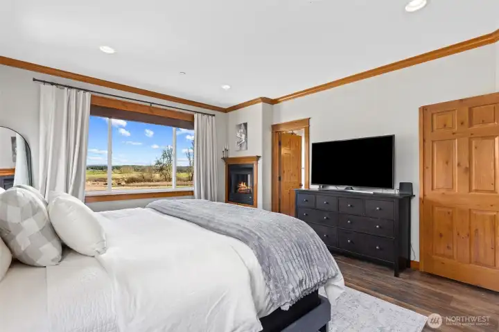 Primary bedroom.  Look at the nice view out back!!