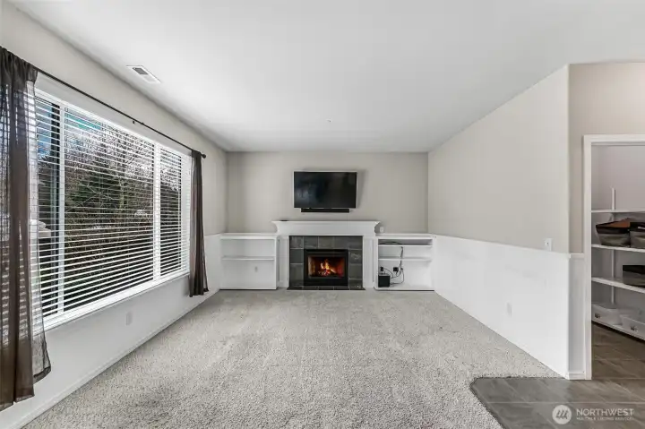 Great Room / Living room with gas fireplace and built-ins