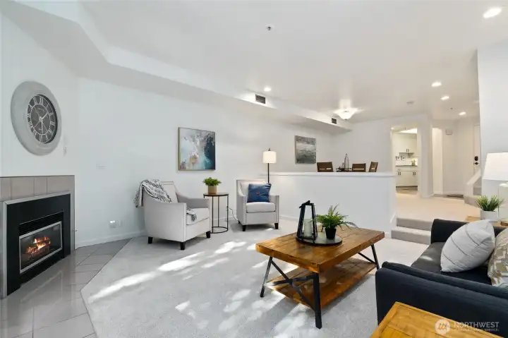 Spacious living area with cozy gas fireplace