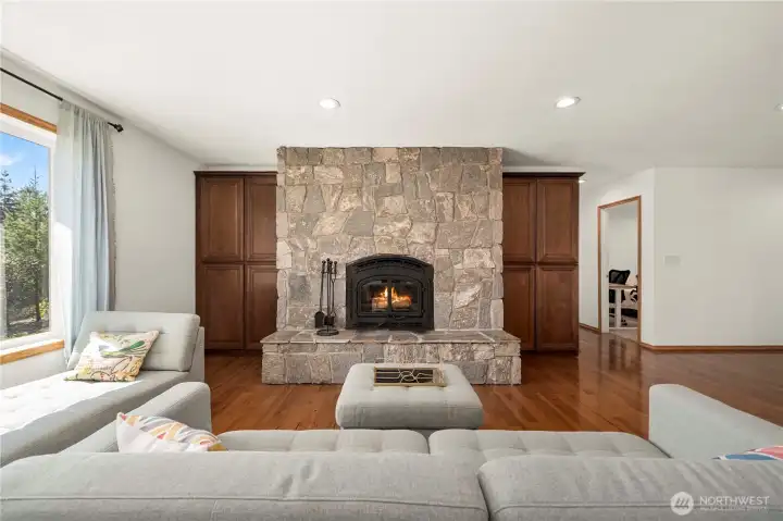 Cozy up by the impressive Quadra-Fire wood-burning fireplace—an efficient, high-performance insert with advanced air control for steady warmth and ambiance.