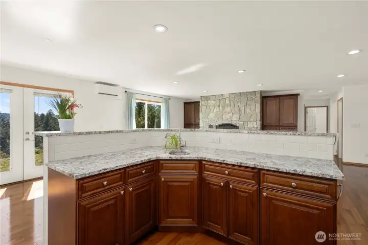 Large prep island with a second sink—perfect for cooking, entertaining, and enjoying the view while you work.