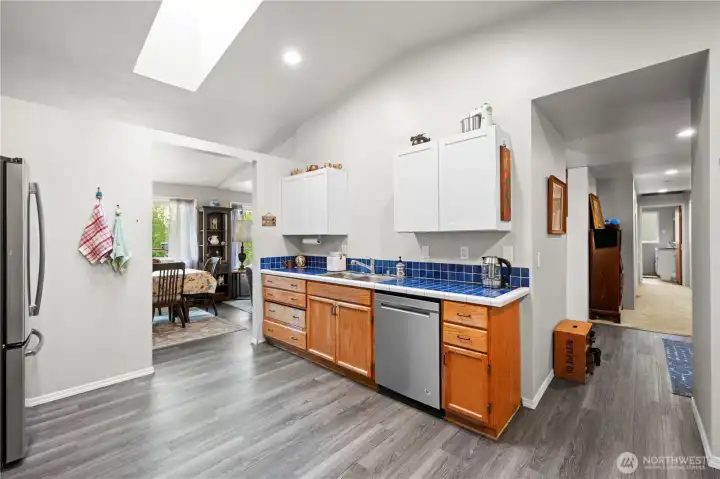 New LVP flooring in kitchen and entryway.