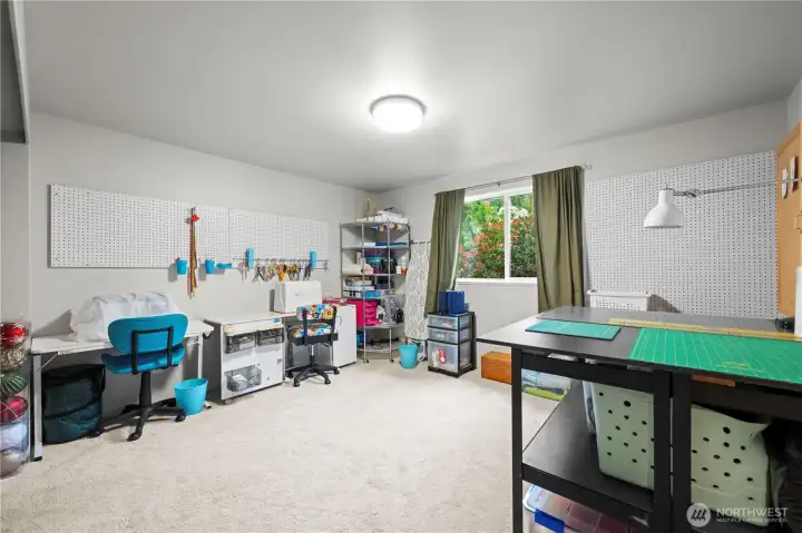 Large bedroom for guests or make it your own craft room or office!