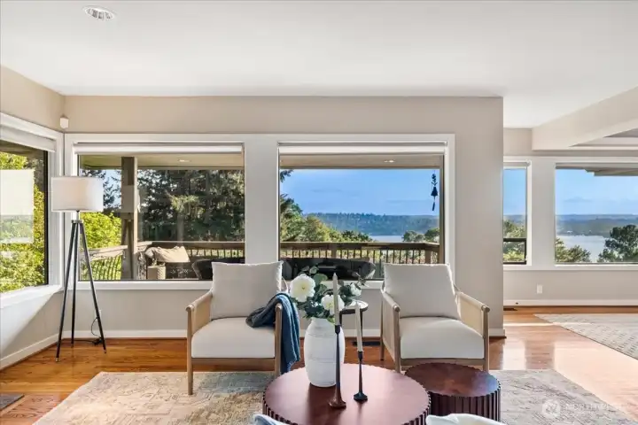 From the formal living room, one of two main-level decks offers the perfect spot to take in the view or entertain.