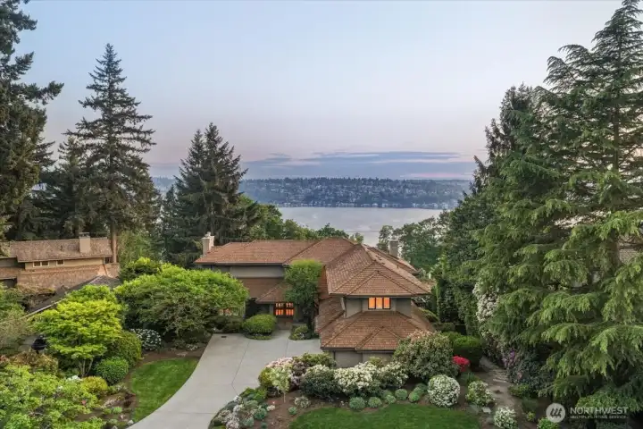 With gorgeous landscaping in both the front and back yards, stunning water views, and a coveted Island Point location, this home truly has it all.