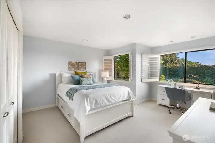 One of three light filled bedrooms on the lower level.