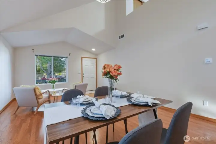Dining area, living room, vaulted ceilings, entry,laminate floor