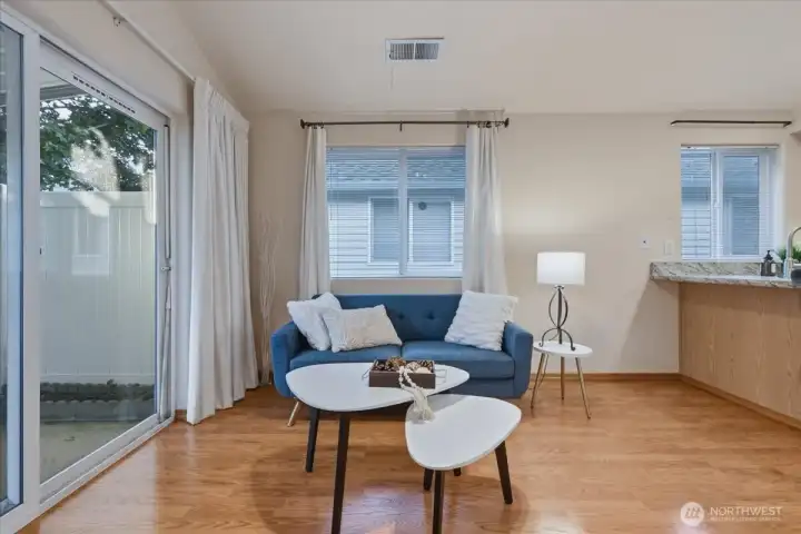 Family room, covered patio access, laminate floor