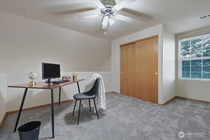 Loft, ceiling fan, wall-to-wall carpet, closet