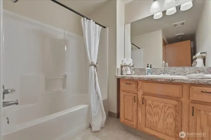 Full bathroom on upper level, tub/shower combo