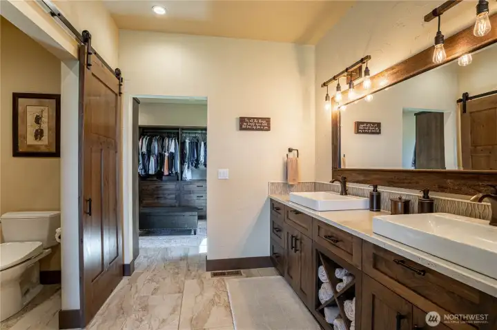 Primary Bathroom Leading Walk-in Closet