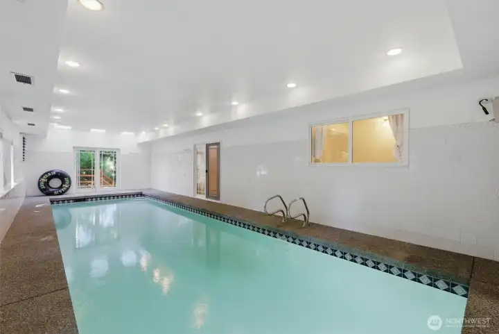 Indoor heated pool with slider to lower deck Indoor heated pool with slider to lower deck