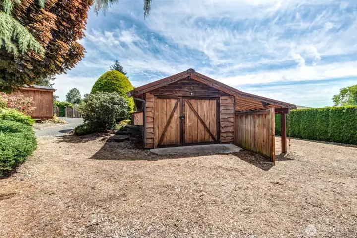 The 40’ x 10’ shop and attached covered storage area create the perfect setup for gardening enthusiasts, hobbyists, craftsmen, and outdoor recreation storage.