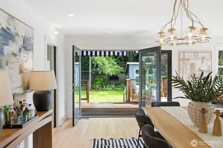French doors open for indoor/outdoor flow.