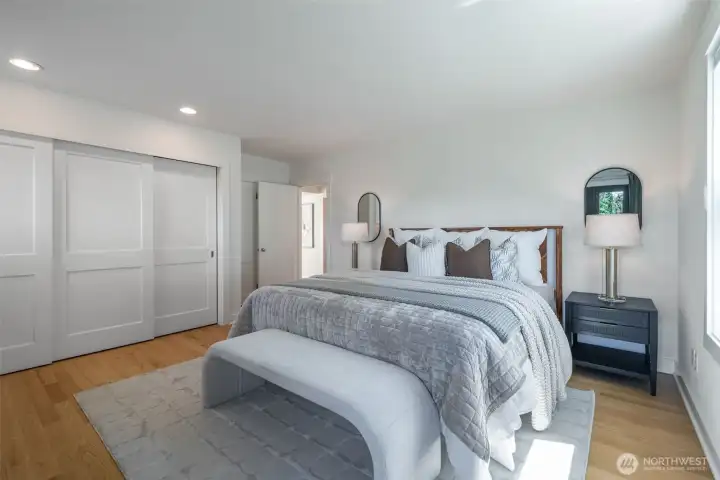 Primary bedroom upstairs.  fits a king sized bed.