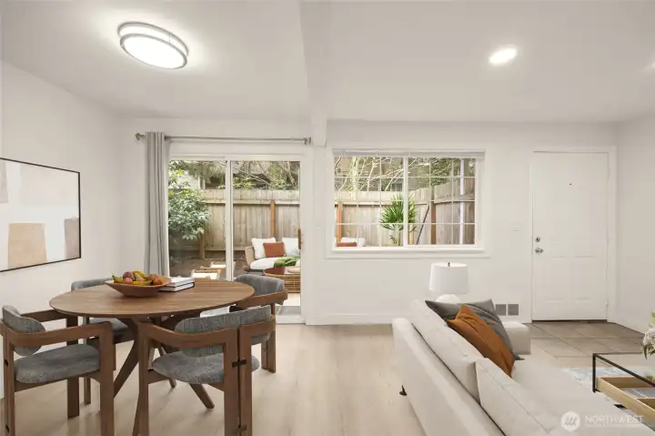 Living area and dining space (virtually staged) Living area and dining space (virtually staged)