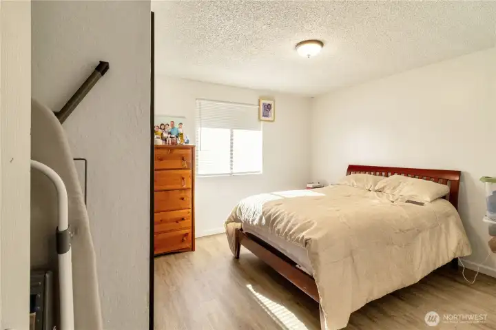 Unit A primary bedroom with generous closet space.