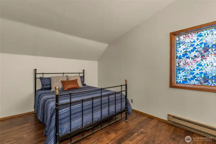 Primary Bedroom with vaulted ceilings Primary Bedroom with vaulted ceilings