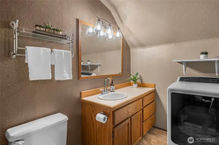 Primary bath with shower and laundry Primary bath with shower and laundry