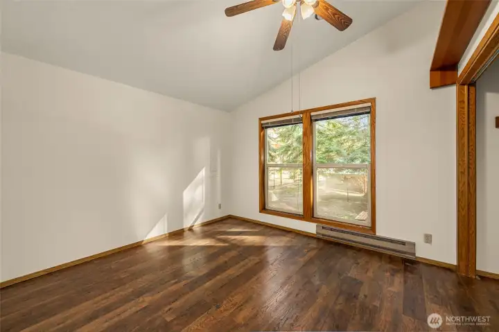 Bedroom 2 with vaulted ceilings and full closet Bedroom 2 with vaulted ceilings and full closet