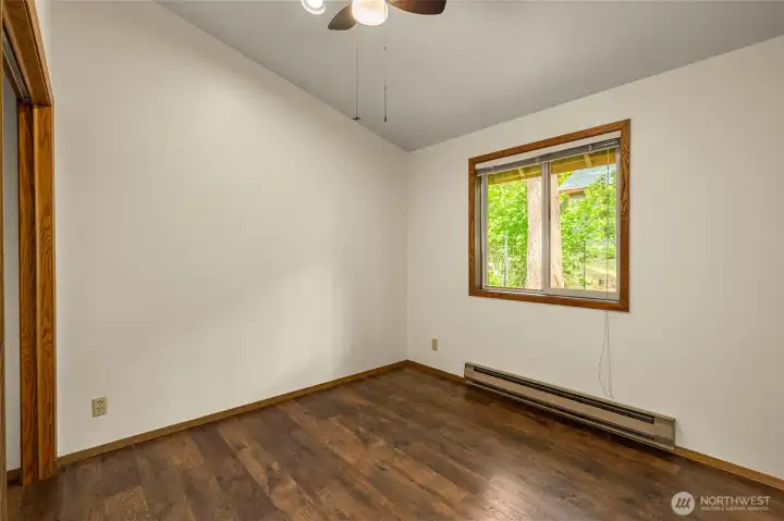 Bedroom 3 with vaulted ceilings and full closet Bedroom 3 with vaulted ceilings and full closet