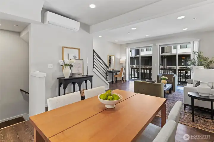 Bright and open main living level with wide-plank flooring, abundant natural light, and seamless flow for everyday living and entertaining. Bright and open main living level with wide-plank flooring, abundant natural light, and seamless flow for everyday living and entertaining.