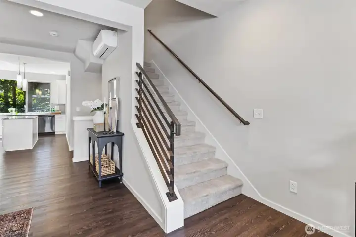 Modern open railing and contemporary finishes create a clean, sophisticated aesthetic throughout the home. Modern open railing and contemporary finishes create a clean, sophisticated aesthetic throughout the home.