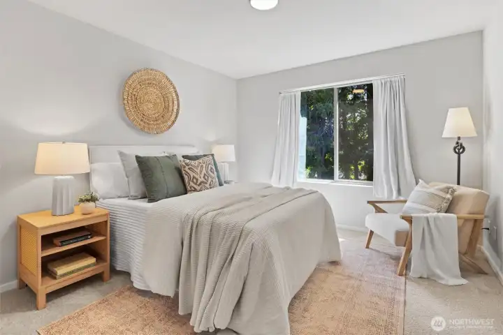 Spacious secondary bedroom with large window, generous proportions, and easy access to a full bath. Spacious secondary bedroom with large window, generous proportions, and easy access to a full bath.