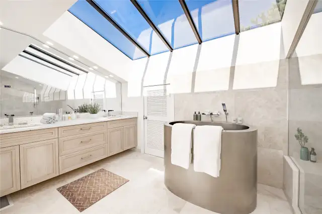 Primary bath heated marble floors, stainless steel Japanese soaking tub, dual vanities w/granite