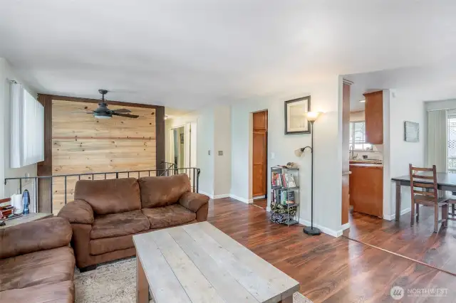 Living room on upper floor and dining area