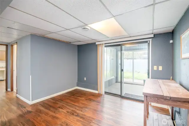 Great room with sliding door to rear yard and hot tub room