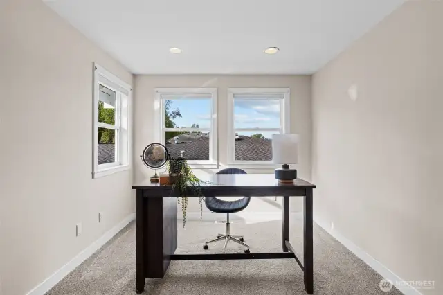 Double doors to home office with lake view.