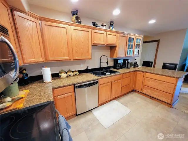 Plenty of countertop space and cabinet space.