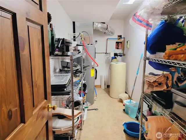 Utility and storage room. New Hot Water tank can be controlled by app. Water softener as well!