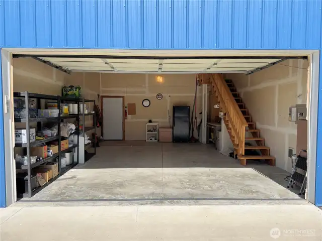 Interior of garage. The stairway leads to the upper levels, perfect for guests.