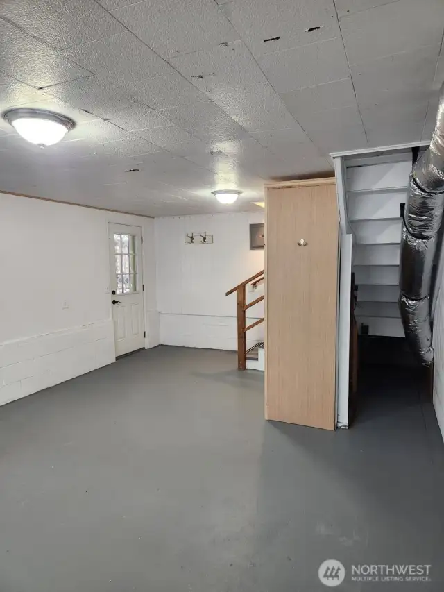 Lower level Bedroom 4 with access to covered patio