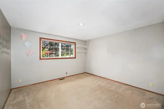 BEDROOM #2  Large  Walk-in closet with sliding door  Window overlooks front yard