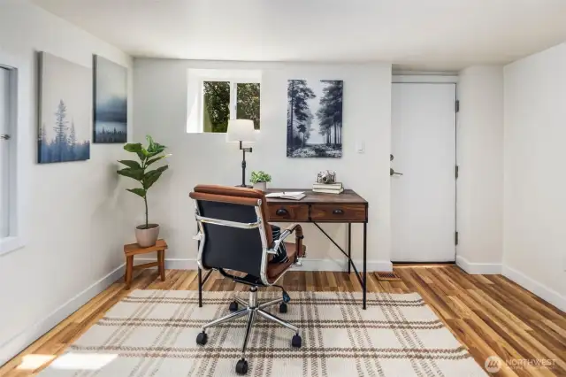 Downstairs 'bonus' area - office, storage, mudroom? Exterior yard access.