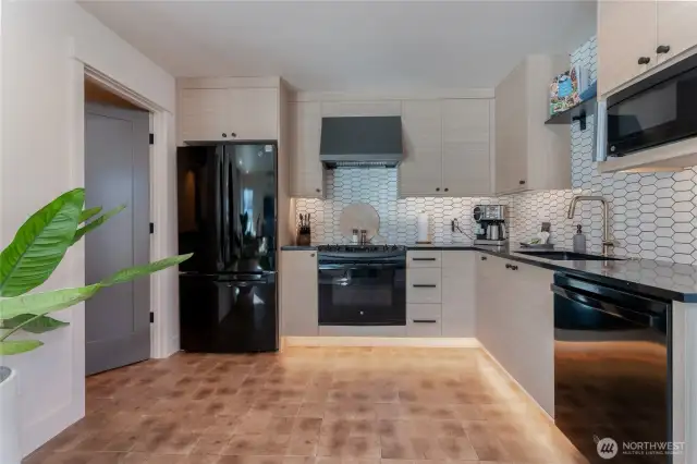 Staged unit F5 shown, similar to F6. Furniture and decor not included.