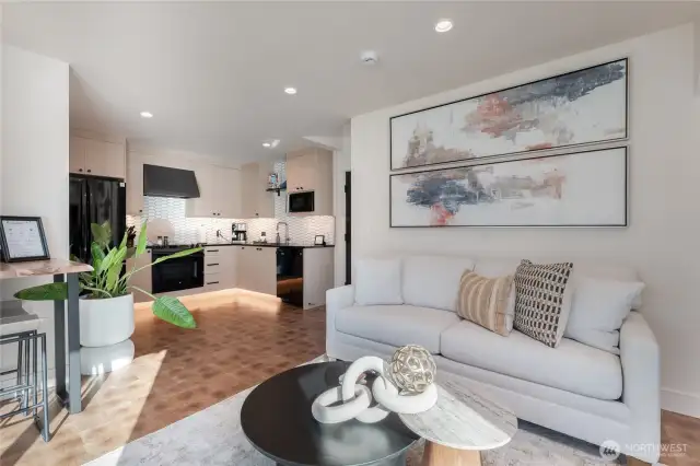Staged unit F5 shown, similar to F6. Furniture and decor not included.