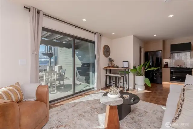 Staged unit F5 shown, similar to F6. Furniture and decor not included.