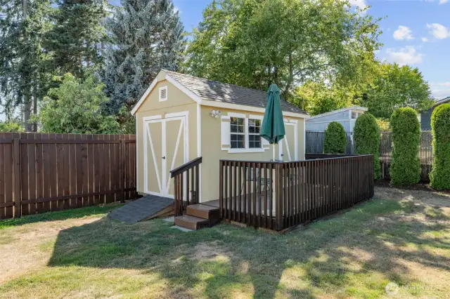 Backyard shed with deck